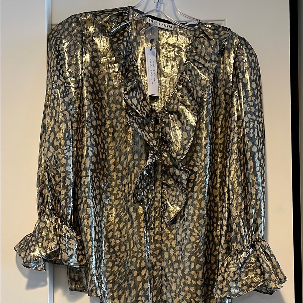 ALICE & OLIVIA. black and gold metallic blouse. Size xs. NWT